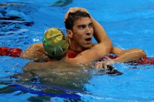 RIO DE JANEIRO, BRAZIL - AUGUST 11: Michael Phelps of the United States embraces Thiago Pereira of Brazil after winning the Men's 200m Individual Medley Final on Day 6 of the Rio 2016 Olympic Games at the Olympic Aquatics Stadium on August 11, 2016 in Rio de Janeiro, Brazil. (Photo by Al Bello/Getty Images)