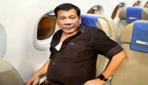 Duterte rides in commercial plane
