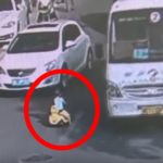 Watch: Chinese Kid Riding In His Toy Car In The Middle Of A Busy Road